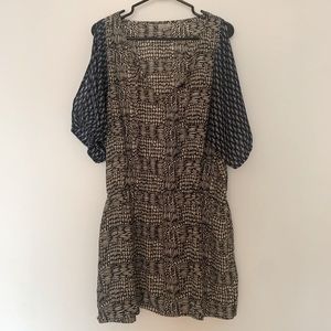 Geometric dress with sleeve cutouts
